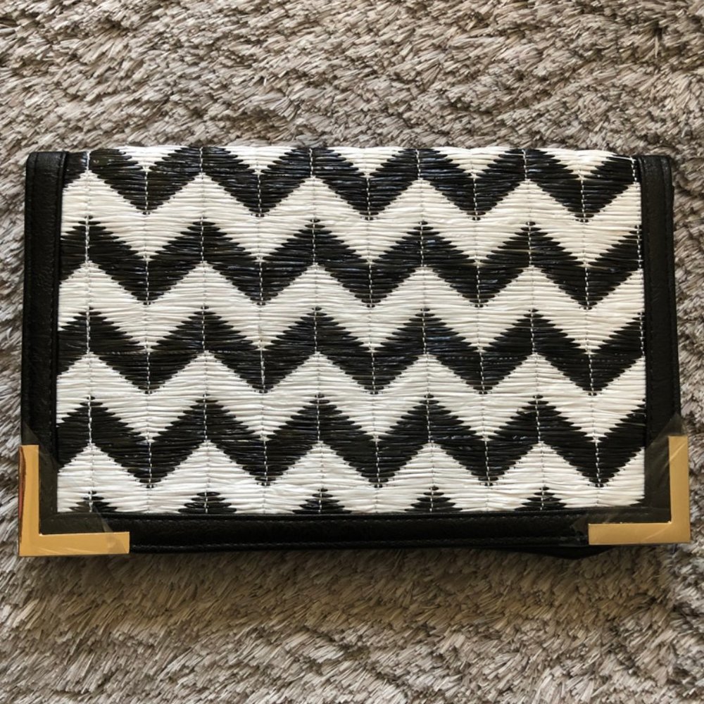 CAPELLI of NEW YORK Black & White Woven Clutch Bag